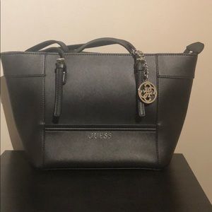 Never used! Black handbag by Guess